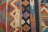 Orientmattor Kelim Chobi 64921 rug with intricate geometric patterns, traditional woven design in warm earthy tones.