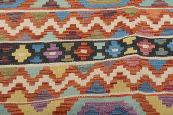 Orientmattor Kelim Chobi 64921 with traditional woven pattern, detailed geometric motifs, and earthy tones on a neutral background.