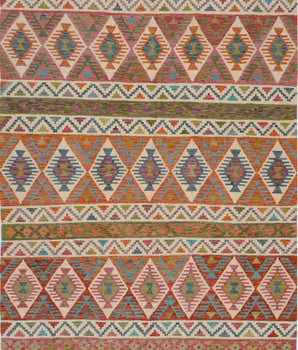 Orientmattor Kelim Chobi rug featuring traditional woven patterns and earthy colors, detailed close-up of the textured textile.