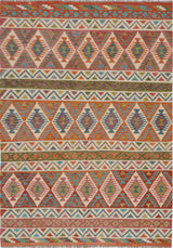 Orientmattor Kelim Chobi rug featuring traditional woven patterns and earthy colors, detailed close-up of the textured textile.