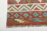 Orientmattor Kelim Chobi 64960 rug with intricate geometric patterns and warm earthy tones, traditional handmade wool textile.