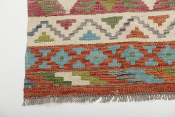 Orientmattor Kelim Chobi 64960 rug with intricate geometric patterns and warm earthy tones, traditional handmade wool textile.
