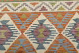 Colorful Kelim Chobi rug from Orientmattor with intricate geometric patterns, showcasing traditional handmade craftsmanship.