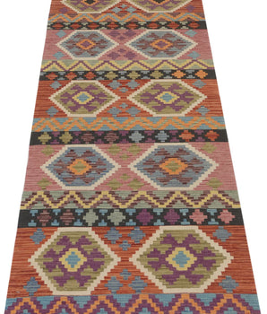Orientmattor Kelim Chobi 64964 rug with intricate geometric patterns and warm earthy tones, woven with traditional craftsmanship.