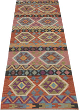 Orientmattor Kelim Chobi 64964 rug with intricate geometric patterns and warm earthy tones, woven with traditional craftsmanship.