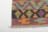 Colorful Orientmattor Kelim Chobi 64964 with intricate woven patterns on a traditional rug.