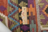 Orientmattor Kelim Chobi 64964 rug with intricate geometric patterns and warm earthy tones, showcasing traditional handcrafted design.