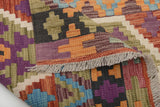 Orientmattor Kelim Chobi 64964 rug with intricate geometric patterns and warm earthy tones, detailed close-up view.