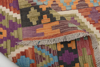 Orientmattor Kelim Chobi 64964 rug with intricate geometric patterns and warm earthy tones, detailed close-up view.