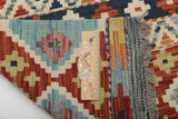 Kelim-Chobi 64967 from Orientmattor featuring intricate patterns and warm colors on a textured background.