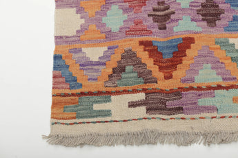 Colorful Orientmattor Kelim Chobi 64972 with geometric patterns on woven fiber background, showcasing traditional craftsmanship.