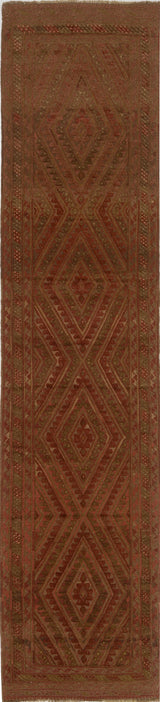 Orientmattor Mushvani 64759 Kelim rug with intricate geometric patterns and warm earthy tones on a woven surface.
