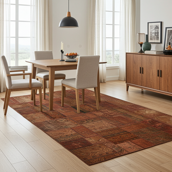 Colorful patchwork rug by Orientmattor showcasing vibrant, mixed fabric patterns in a detailed patchwork design.