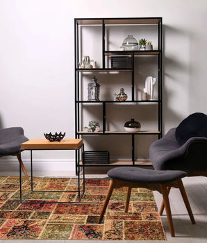Colorful patchwork rug from Orientmattor with vibrant patterns and mixed fabric textures, showcasing a unique patchwork design.