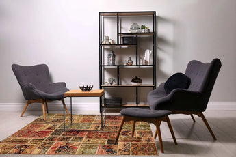 Colorful patchwork rug from Orientmattor with vibrant patterns and mixed fabric textures, showcasing a unique patchwork design.