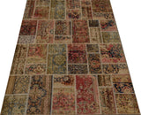 Colorful patchwork rug with geometric patterns from Orientmattor, featuring a mix of vibrant fabric patches and detailed stitching.