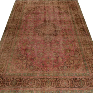 Stonewashed Orientmattor rug with soft, faded fabric in a light, neutral tone, shown in close-up detail.