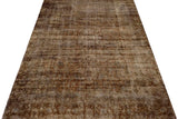 Vintage Orientmattor 60981 rug featuring intricate patterns and warm colors, displayed on a wooden floor.
