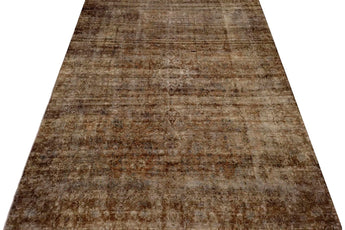 Vintage Orientmattor 60981 rug featuring intricate patterns and warm colors, displayed on a wooden floor.