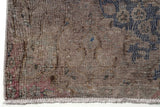 Orientmattor Vintage 61003 rug showcasing intricate patterns and rich colors on a textured surface.