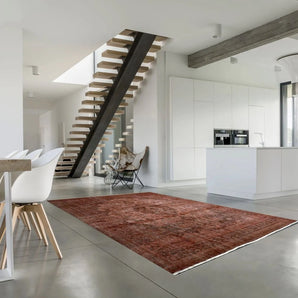 Orientmattor Vintage 63183 rug featuring intricate patterns and rich colors, beautifully displayed on a wooden floor.