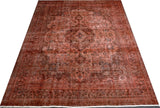 Orientmattor Vintage 63183 rug featuring intricate patterns and rich colors, displayed on a wooden floor.