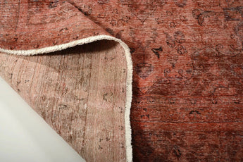 Orientmattor Vintage 63183 rug featuring intricate patterns and rich colors, displayed on a wooden floor.