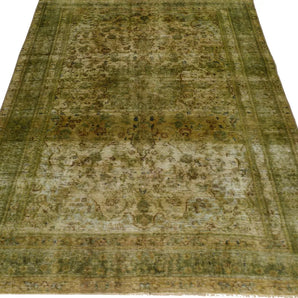 Vintage Orientmattor rug 64283 featuring intricate patterns and warm colors, displayed on a wooden floor.