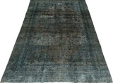 Orientmattor Vintage 64286 rug featuring intricate patterns and rich colors on a textured surface.