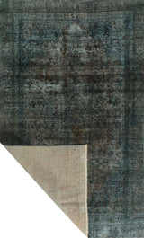 Orientmattor Vintage 64286 rug featuring intricate patterns and rich colors, displayed on a wooden floor.