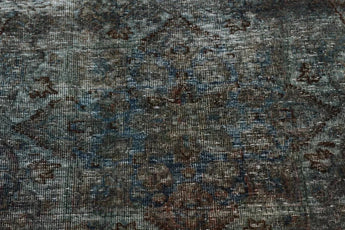 Vintage Orientmattor 64286 rug featuring intricate patterns and rich colors on a textured surface.