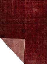 Orientmattor Vintage 64299 rug featuring intricate patterns and rich colors on a textured surface.
