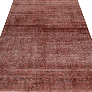 Vintage Orientmattor 64308 rug featuring intricate patterns and rich colors, displayed in a well-lit setting.