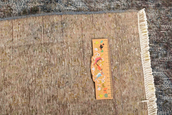Vintage Orientmattor 64343 rug featuring intricate patterns and rich colors, displayed on a neutral background.