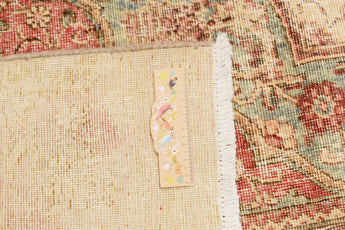Vintage Orientmattor 64439 rug with intricate patterns and warm colors, displayed on a neutral background.