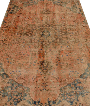Vintage Orientmattor 64470 rug featuring intricate patterns and warm colors on a textured fabric background.