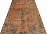 Vintage Orientmattor 64470 rug featuring intricate patterns and warm colors on a textured fabric background.