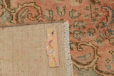 Vintage Orientmattor 64470 rug with intricate patterns and warm colors displayed on a wooden floor.