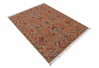 Orientmattor Ghazni 64981 Ziegler/Kazak rug with intricate geometric patterns and warm tones, detailed close-up image.