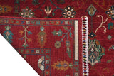 Orientmattor Ariana Oriental handwoven Ziegler/Kazak rug, 239x174 cm with intricate patterns and rich colors, on a flat surface.