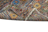 Handknuten Ariana Oriental Ziegler/Kazak rug, 269 x 177 cm, with intricate traditional patterns and rich colors.