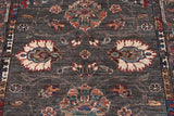 Handknuten Ariana Oriental Ziegler/Kazak rug, 301 x 85 cm, featuring intricate patterns in warm tones.