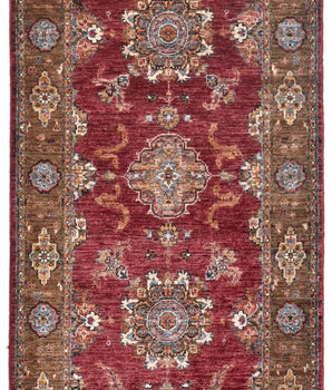 Handwoven Ariana Oriental Ziegler/Kazak rug, 319x81 cm, with intricate traditional patterns and rich colors.