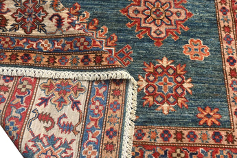 Handknuten Kazak Oriental rug by Orientmattor, Ziegler/Kazak style, 246 x 179 cm, detailed woven pattern and rich colors.