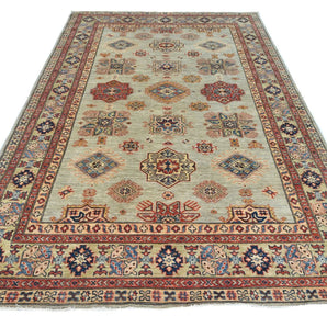 Handknuten oriental Kazak rug by Orientmattor, Ziegler/Kazak style, 266x181 cm, detailed woven pattern in warm tones.