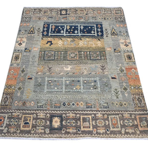 Handwoven Khorjin Oriental rug by Orientmattor, Ziegler/Kazak style, 110x77 cm, detailed geometric patterns in warm tones.