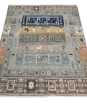 Handwoven Khorjin Oriental rug by Orientmattor, Ziegler/Kazak style, 110x77 cm, detailed geometric patterns in warm tones.