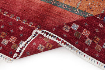 Handwoven Khorjin Oriental rug by Orientmattor, Ziegler/Kazak style, 295x211 cm with intricate patterns on a colorful background.