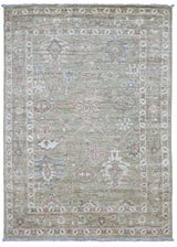 Handknuten Ushak Oriental rug, Ziegler/Kazak style, 207x149 cm, with intricate traditional patterns on a soft background.