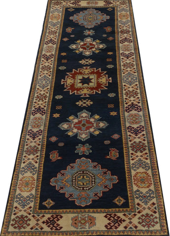Kazak-Super 64579 Ziegler/Kazak rug by Orientmattor with intricate geometric patterns and vibrant colors on a woven surface.